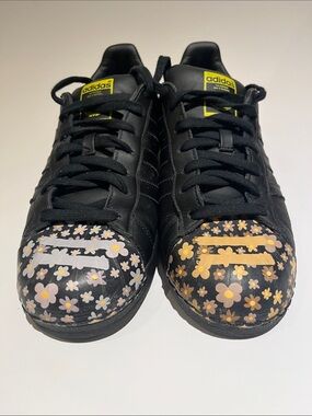 Adidas Superstar shell top Sneakers by Pharrell Williams.